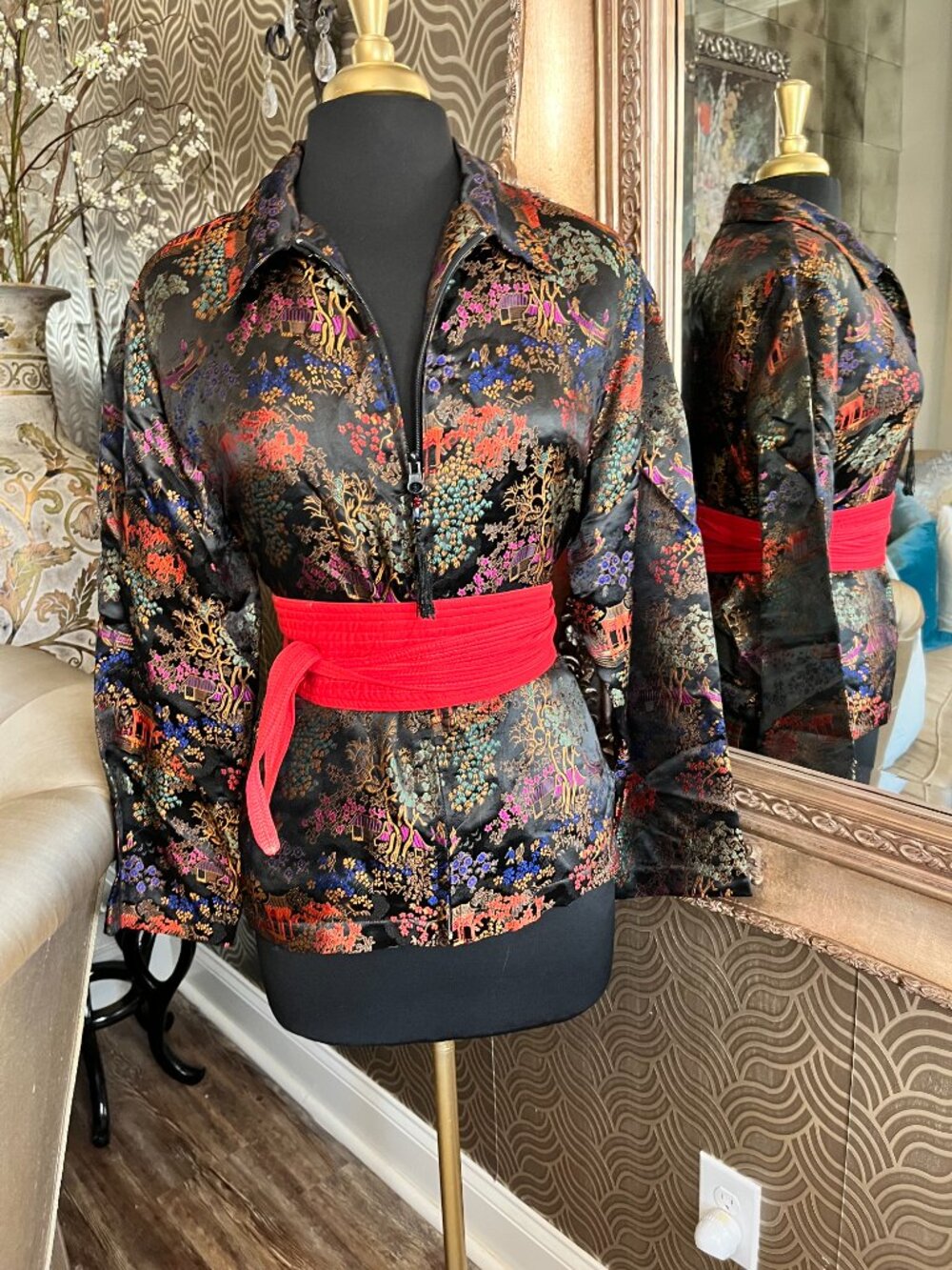 Chico's vibrant Asian-inspired print on a black satin-finish jacket